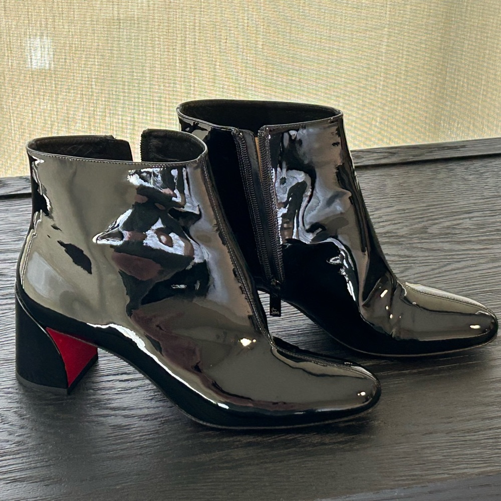 Christian Louboutin black patent leather booties. Never worn!